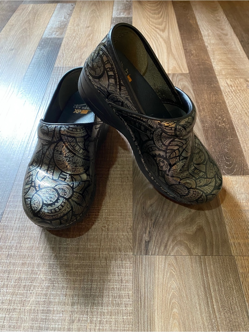 Dansko Black Clog with Metallic Floral Pattern